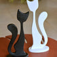 Juodos ir baltos katyčių dvynių medinės skulptūrėlės 34 cm. ir 39 cm.