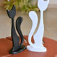 Juodos ir baltos katyčių dvynių medinės skulptūrėlės 34 cm. ir 39 cm.
